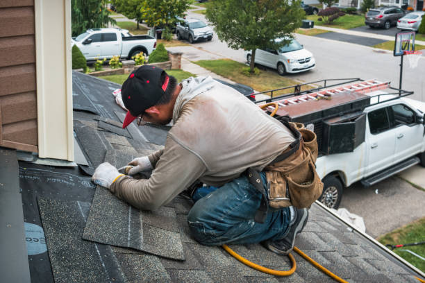 Professional Flat Roof Repair technician working in Castile, NY